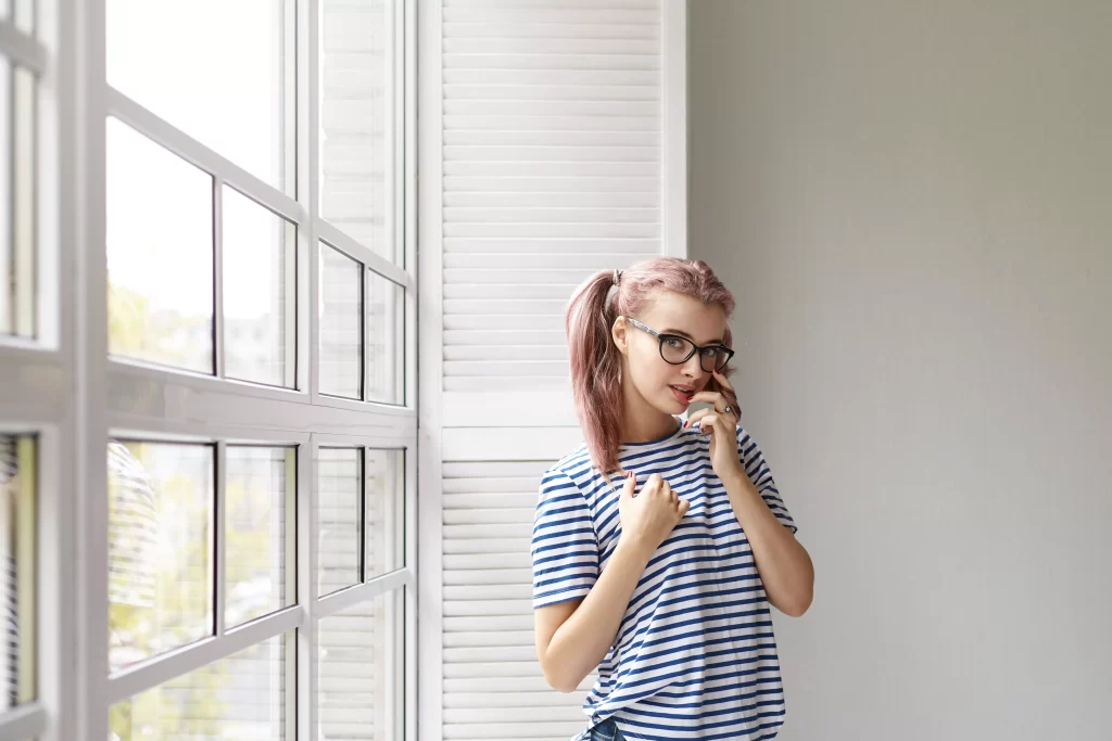 AnyConv.com__expressive-young-girl-posing-indoor